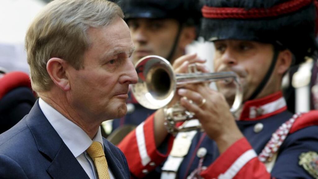 The Taoiseach, Enda Kenny, reviews an honour guard as he arrives for a meeting with the Italian prime minister in Rome yesterday. Photograph: Max Rossi/Reuters