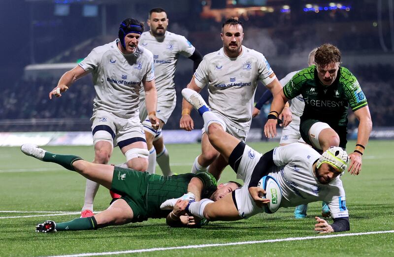 Leinster’s Charlie Ngatai scores his side's first try despite Cian Prendergast of Connacht. Photograph: James Crombie/Inpho