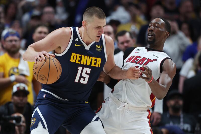 Nikola Jokic of the Denver Nuggets drives to the basket against Bam Adebayo of the Miami Heat during the first quarter in Game 2 of the 2023 NBA Finals at Ball Arena in Denver, Colorado. Photograph: Matthew Stockman/Getty Images