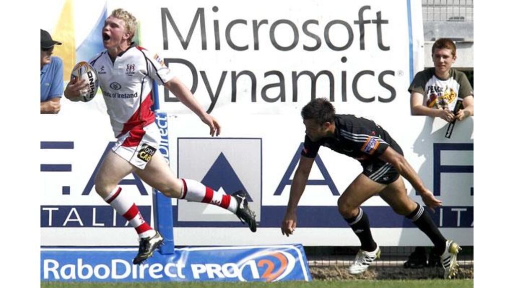Nevin Spence is trip-tackled by Aironi's Roberto Quartaroli during today's match in Viadana. Photograph: Matteo Ciambelli/Inpho