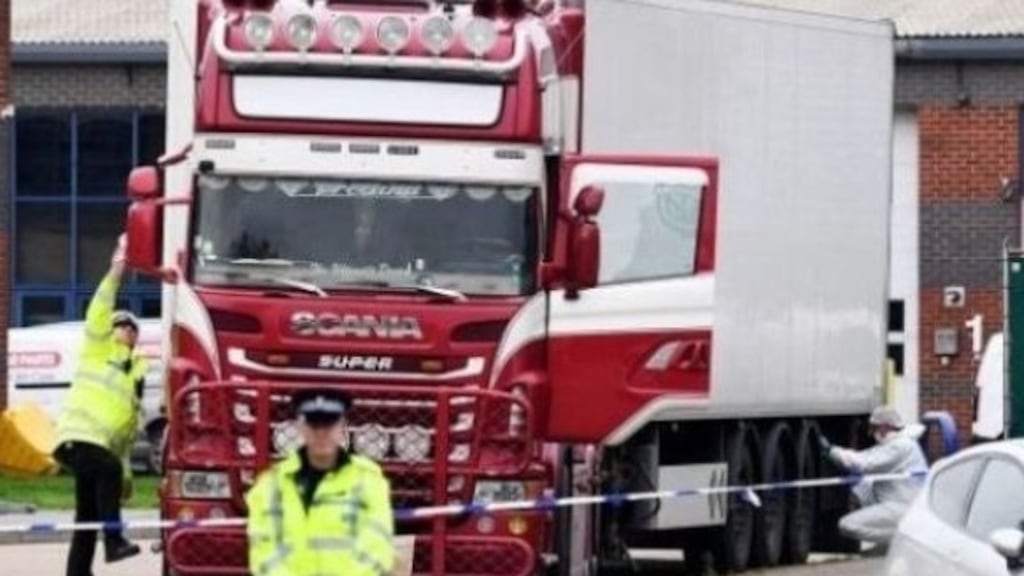 Essex police and forensic officers examine a lorry after the bodies of 39 Vietnamese nationals were discovered in its trailer in Essex. File photograph: Leon Neal/Getty Images