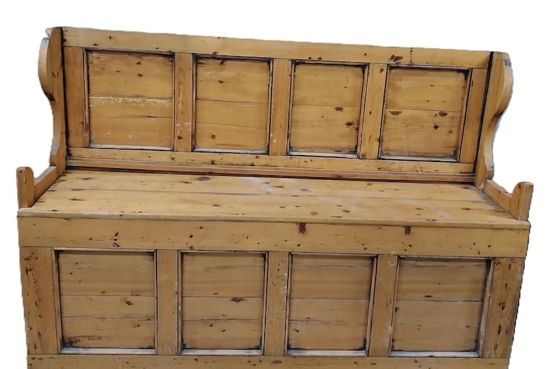 Old Irish dressers, settle beds and dug-out chairs in a vernacular sale