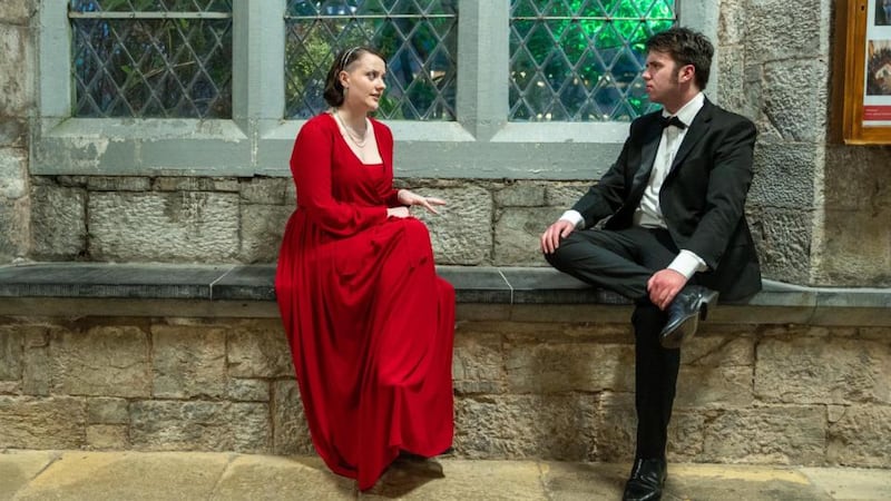 Competitors Bevin Armstrong (left) from UCD LawSoc and Olcan McSparron from Queen University Belfast taking a moment in the stone corridor at UCC before the grand final of the Irish Times Debate 2022 on Friday night. Photograph: John Allen/Provision