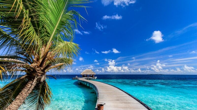 The Arrival Jetty at Dusit Thani Maldives on Mudhdhoo Island.
