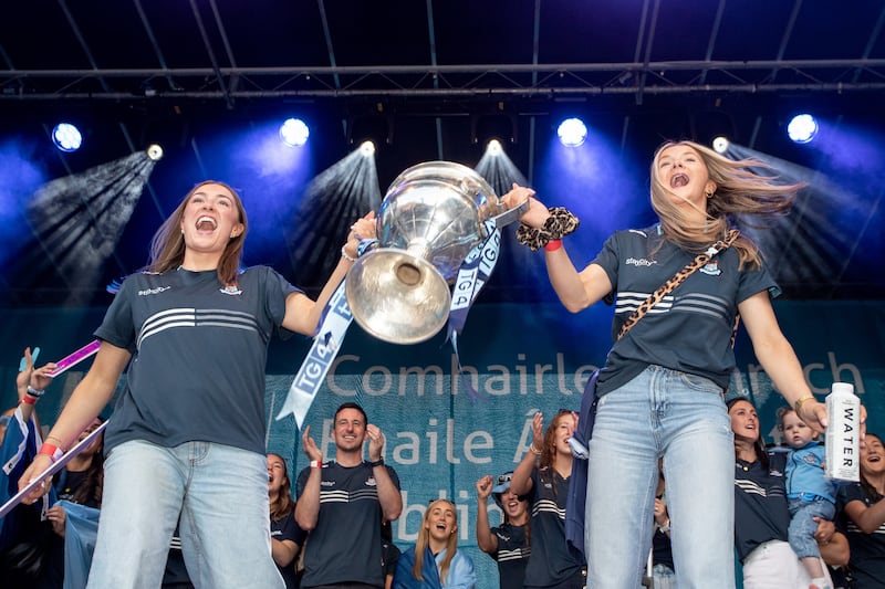 Dublin's Niamh Donlon and Caoimhe O’Connor lift the Brendan Martin Cup. Photograph: Inpho