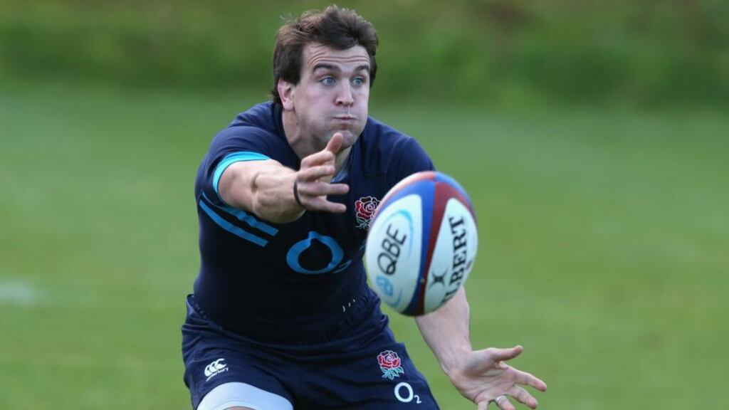 Lee Dickson passes the ball during the England training session held at Pennyhill Park. Photograph:   David Rogers/Getty Images