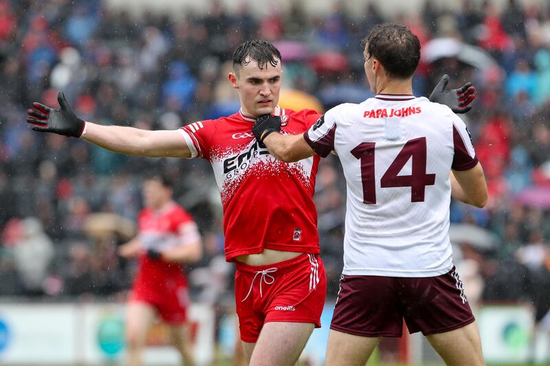 Derry's Diarmuid Baker and Galway's Robert Finnerty at Celtic Park on Sunday. Photograph: Lorcan Doherty/INPHO