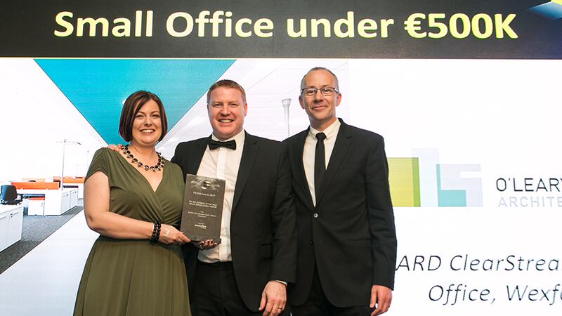 Martin Johnston, Interiors Director, Hunt Office Interiors, presents the Fit Out Project of the Year – Small Office under €500K award to Sharon & Cathal O'Leary, O'Leary Sludds Architects