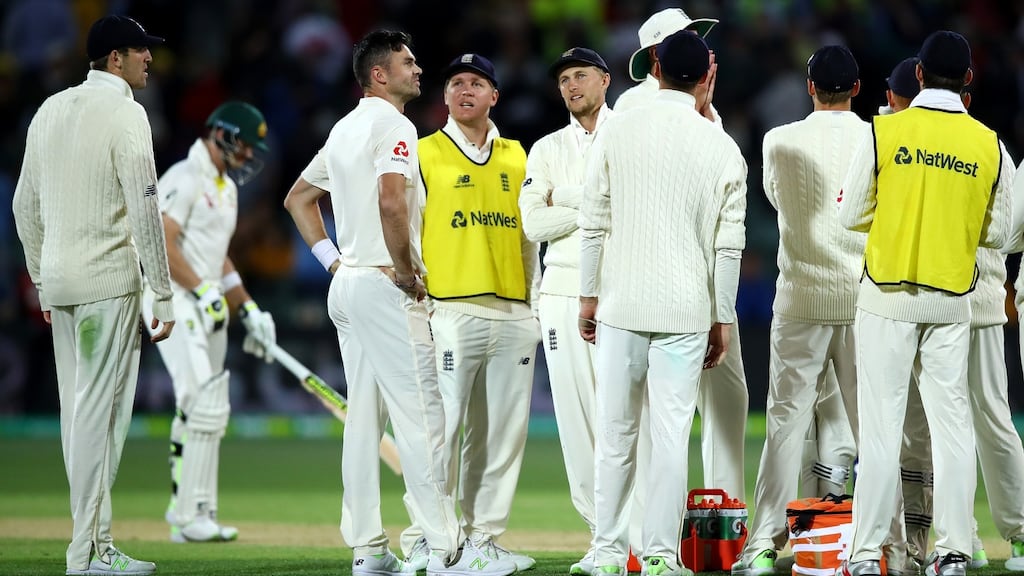 Joe Root and James Anderson with their England teammates during day three of the second Test match of the 2017/18 Ashes series. Photograph: Cameron Spencer/Getty Images