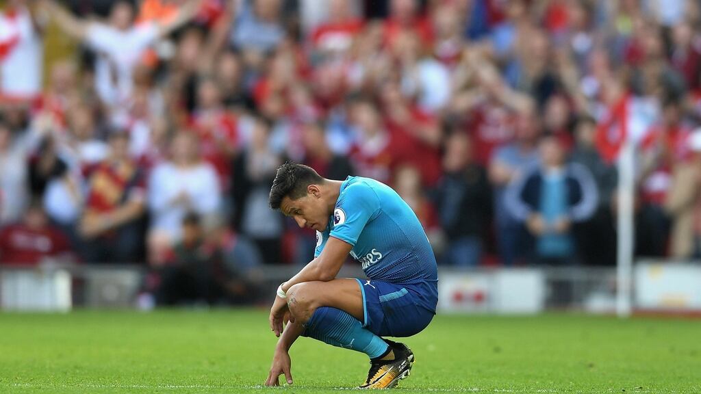 Arsenal’s Alexis Sanchez looks dejected after their 4-0 loss to Liverpool at Anfield. Photo: Michael Regan/Getty Images