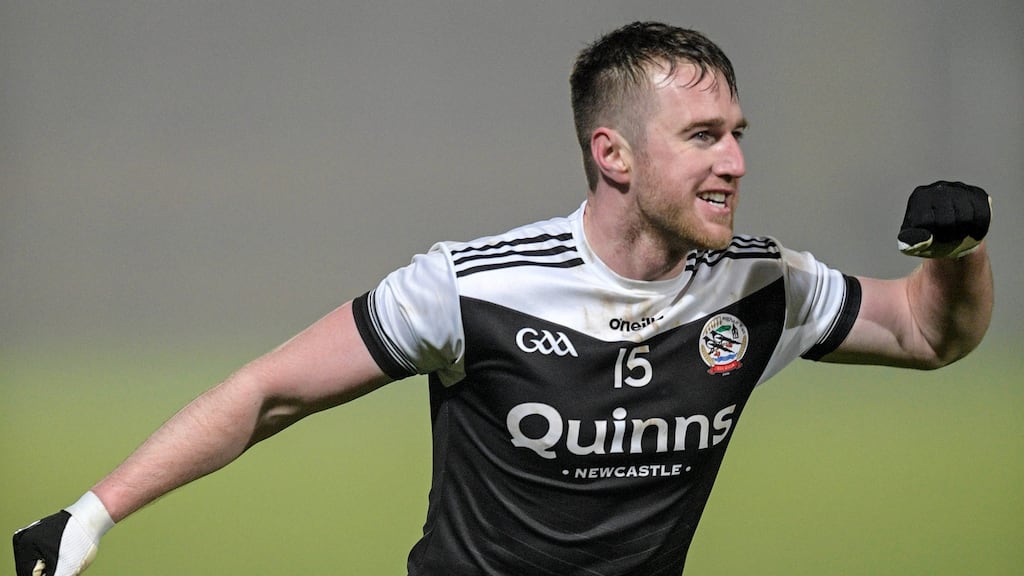 Kilcoo’s Paul Devlin celebrates after he ensures victory with a converted free in extra-time of the AIB Ulster Club SFC semi-final at the Athletic Grounds. Photograph: Cathal McCosker/Inpho
