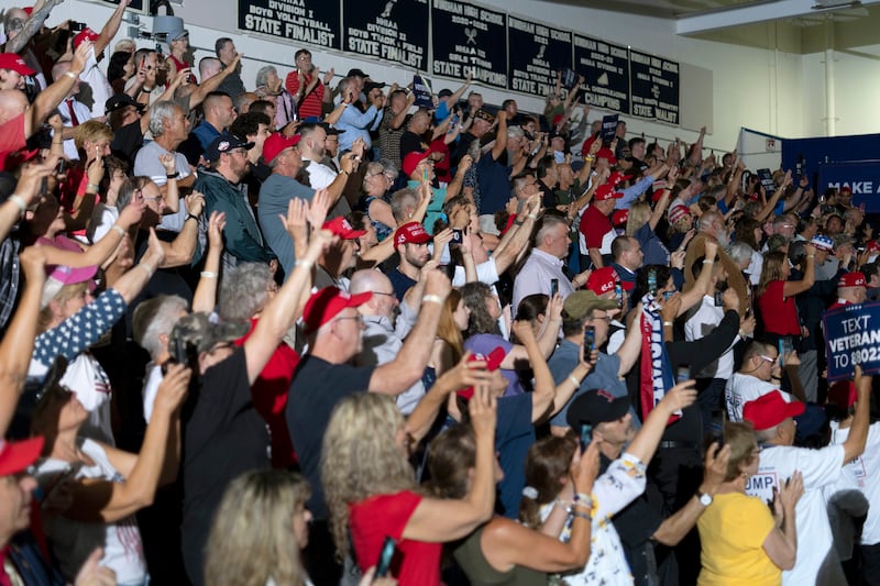 Supporters of Donald Trump cheer as he addresses them in Windham, New Hampshire, on Tuesday. Photograph: David Degner /New York Times