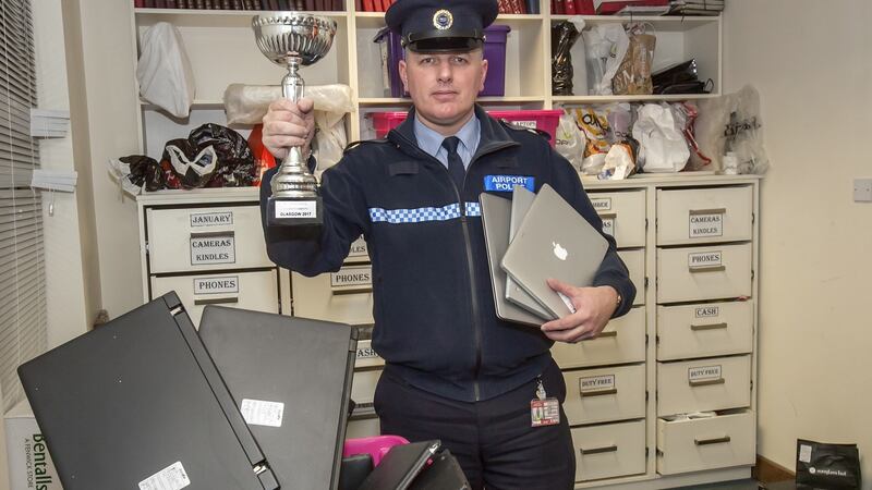 Brendan Lavin in lost property, Dublin Airport.