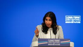 Britain’s home secretary warns of ‘hurricane’ of migrants in hardline Tory conference speech