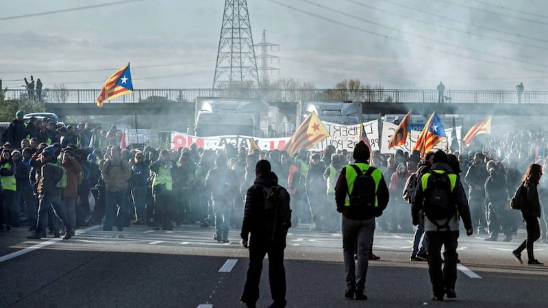 Protesters block the AP-7 road in Figueres on Wednesday, as part of a strike called in Catalonia to protest against the imprisonment of pro-independence leaders. Photograph: Robin Townsend/EPA
