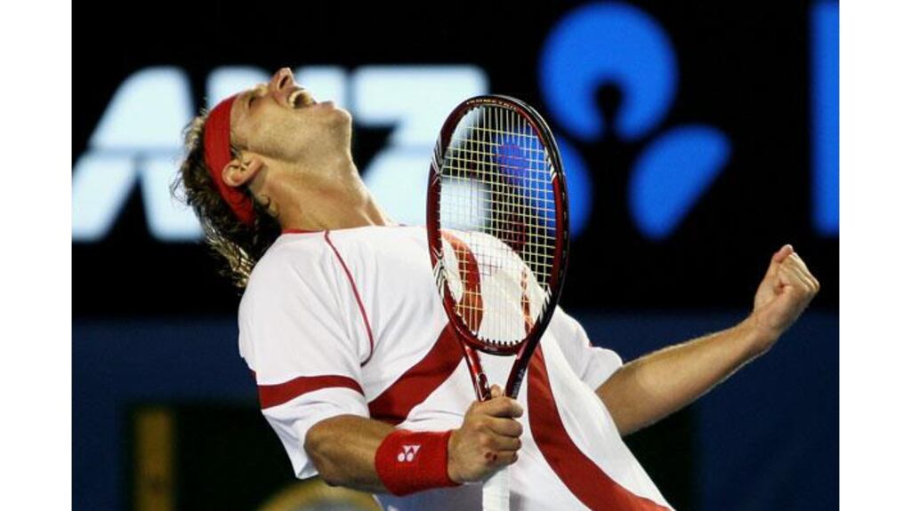 David Nalbandian of Argentina celebrates match point in his first round match against Lleyton Hewitt of Australia during day two of the Australian Open at Melbourne Park, Australia. Photograph: Jeremy Ng/Getty Images