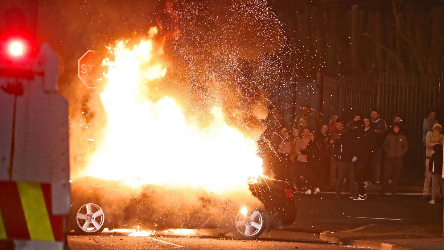 A hijacked car explodes after being set on fire in Derry. Photograph: PA