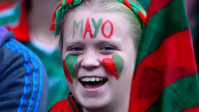 I love Mayo: A fan in green and red during the All-Ireland football final between Dublin and Mayo at Croke Park. Photograph: Cyril Byrne/The Irish Times