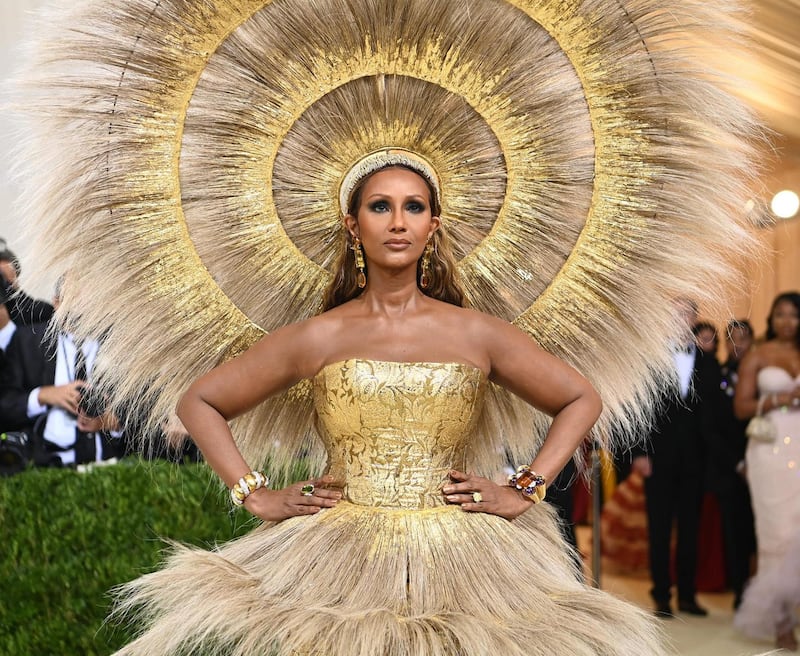 Iman at this year’s Met Gala, wearing a gold ensemble by Dolce & Gabbana and headpiece by Harris Reed. Photograph: Nina Westervelt/New York Times