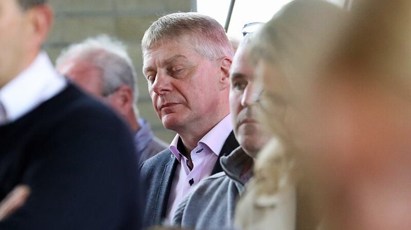 Tony Lunney listens to Fr Oliver O’Reilly’s sermon condeming the attack on his brother Kevin. Photograph: Lorraine Teevan