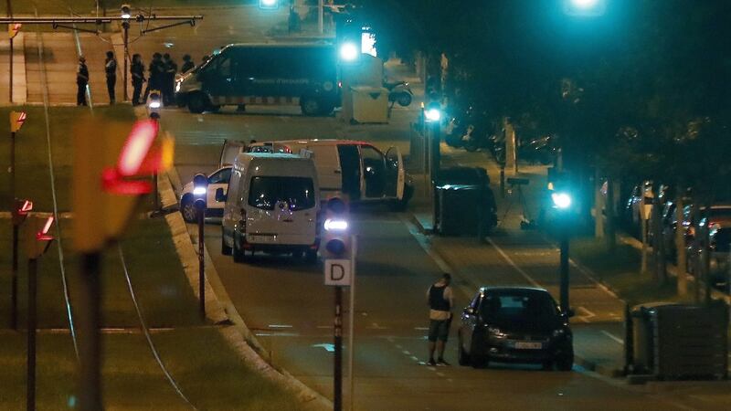 Spanish Police at the site where one of the alleged perpetrators of the Barcelonas terrorist attack, has died in the town of Sant Just Desvern, Barcelona, Spain, 17 August 2017, after a shoot-out with Catalonian police at a security checkpoint. Photograph: EPA