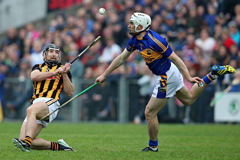 Kilkenny's Richie Hogan and Brendan Maher of Tipperary in the 2014 Division 1 final. Photograph: Cathal Noonan/Inpho