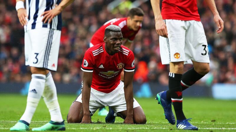 Paul Pogba reacts during the loss to West Brom at Old Trafford. Photo: Nigel Roddis/EPA