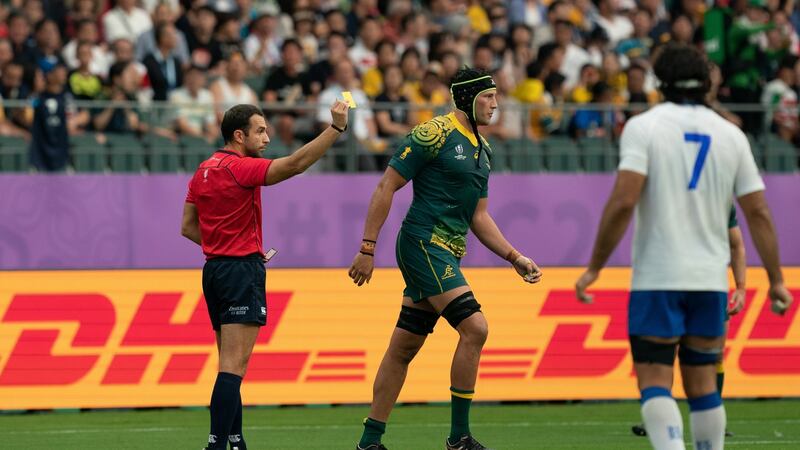 Australia’s Adam Coleman is shown a yellow card during his side’s win over Uruguay. Photograph: Hiroshi Yamamura/EPA