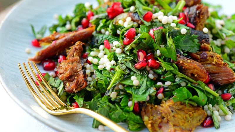 Crispy lamb and giant cous cous salad