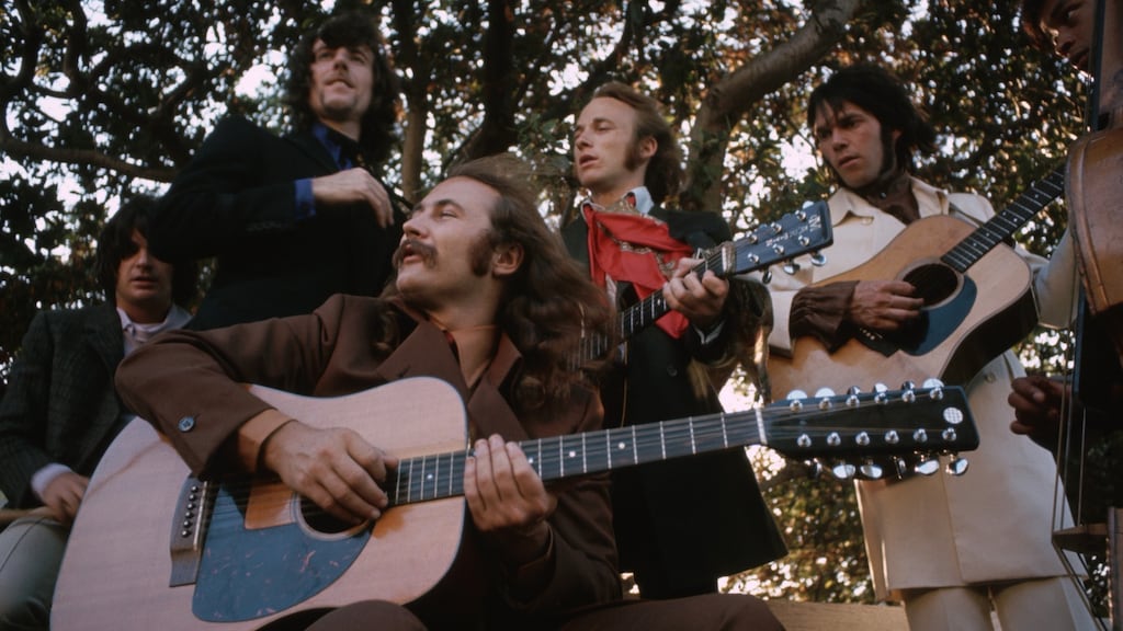 Crosby, Stills, Nash, and Young: romantic lyrics and penchant for political protest galvanised a devoted following. Photograph: Henry Diltz/Corbis