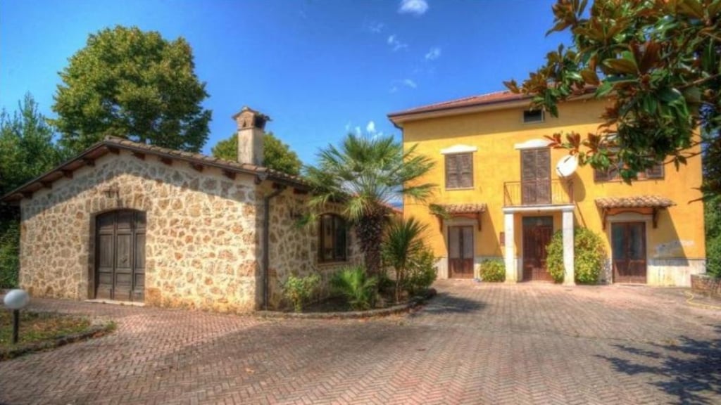 This period farmhouse is surrounded by fields in Lazio, south of Rome in Italy.