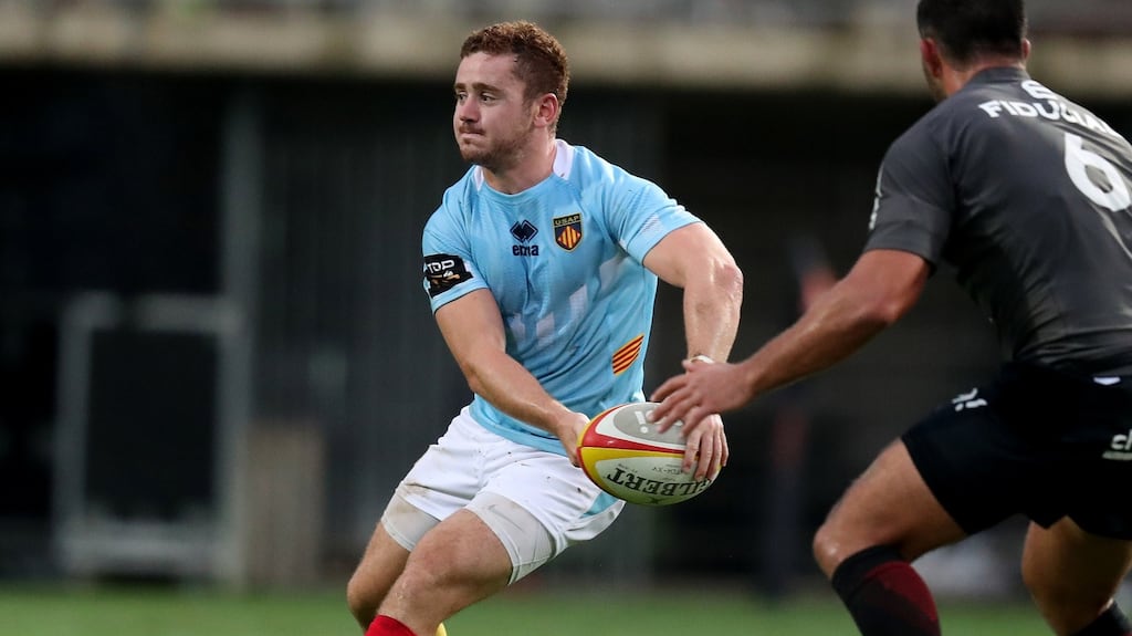 Perpignan’s Paddy Jackson plays a pass during their pre-season friendly with Toulouse. Photo: Billy Stickland/Inpho