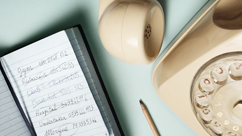 Address books used to sit beside phones. Photograph: Getty Images