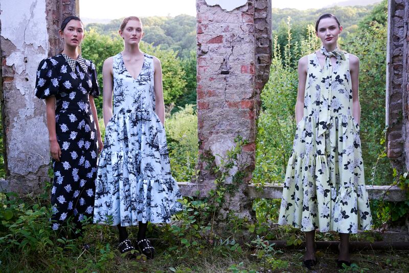 Dresses from Erdem: black and silver dress, drop-waisted printed dress and yellow floral dress