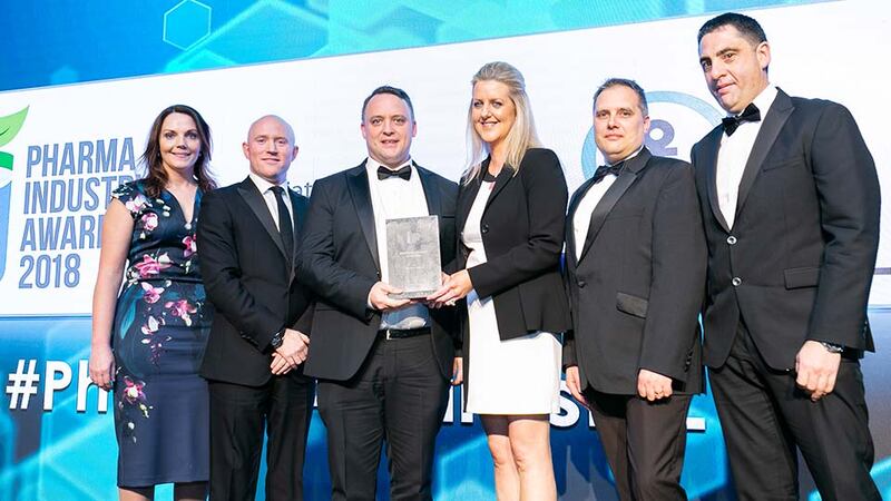 Tom Tobin, Customer Relations Director, Micro-Bio Ireland presents the Biotech Company of the Year award to David Downey, APC.