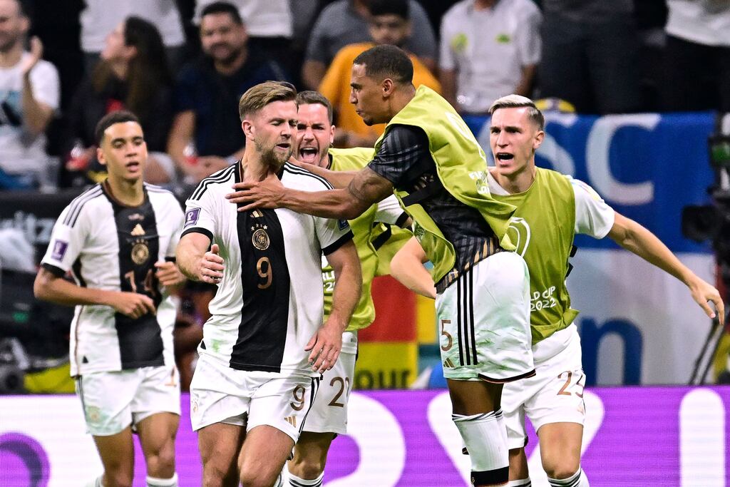 Germany's forward Niclas Fullkrug celebrates with teammates after scoring his team's equaliser against Spain. Photograph: Javier Soriano/AFP via Getty