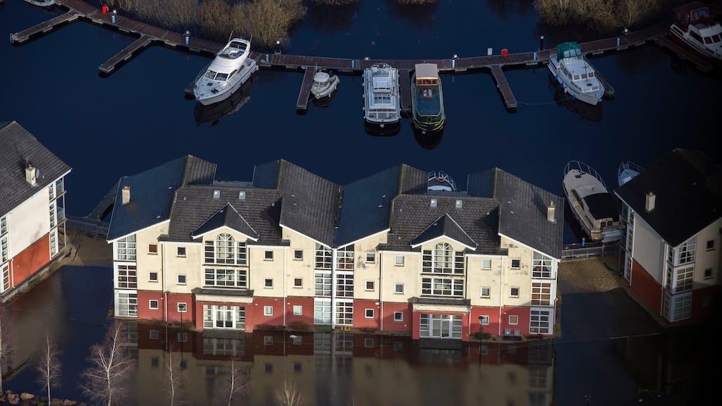 Marooned: buildings surrounded by flood waters in Carrick-on-Shannon. Photograph: Brenda Fitzsimons