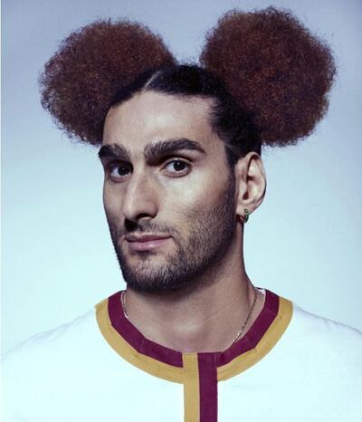 Fellaini's hairstyles in GQ were interesting to say the least.