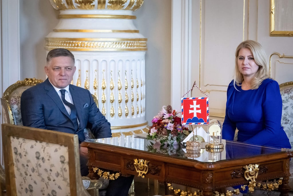 Slovakia's president Zuzana Caputova with the chairman of the Smer-Social Democracy party, Robert Fico, on Monday. She gave him a mandate to try to form a coalition government after his party won nearly 23 per cent of the vote in an election at the weekend. Photograph: Vladmir Simicek/AFP via Getty Images