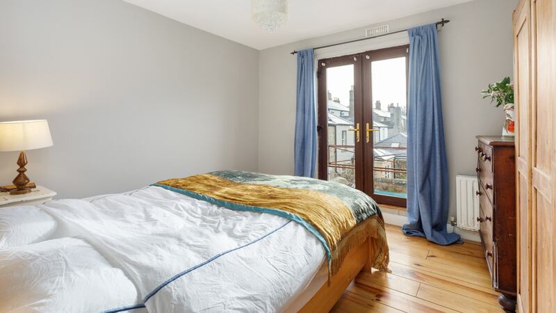 Two bedrooms to the rear have glazed double doors opening out to Juliet balconies.