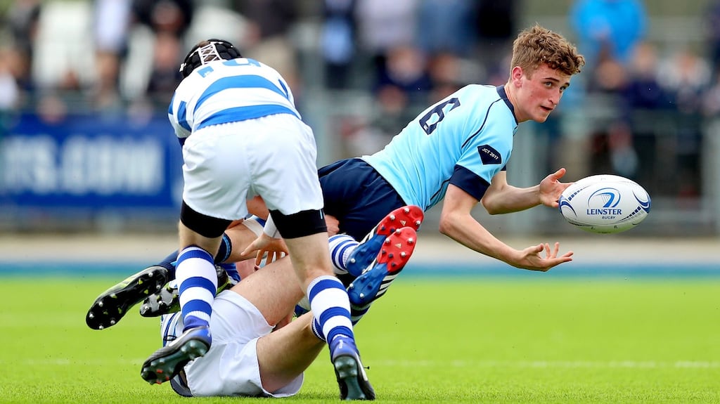 Blackrock College’s Sam Small and Adam Dixon tackle Oscar Hurley of St Michael’s College in the Bank of Ireland Leinster Schools Junior Cup final replay in Donnybrook. Photograph: James Crombie/Inpho