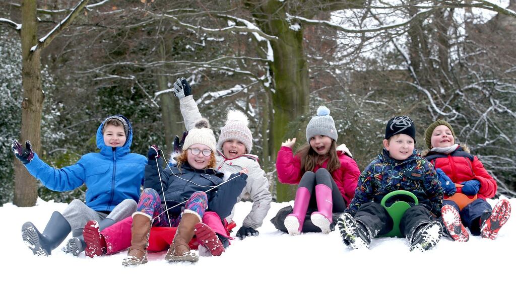 Pupils enjoy a snow day off school. Photograph: Jane Barlow/PA Wire