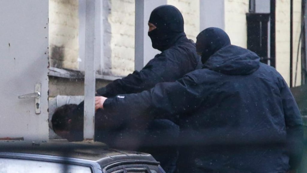 An unidentified suspect (L), detained over the killing of Boris Nemtsov, is escorted while entering a court building in Moscow on Sunday. Photograph: Tatyana Makeyeva/Reuters