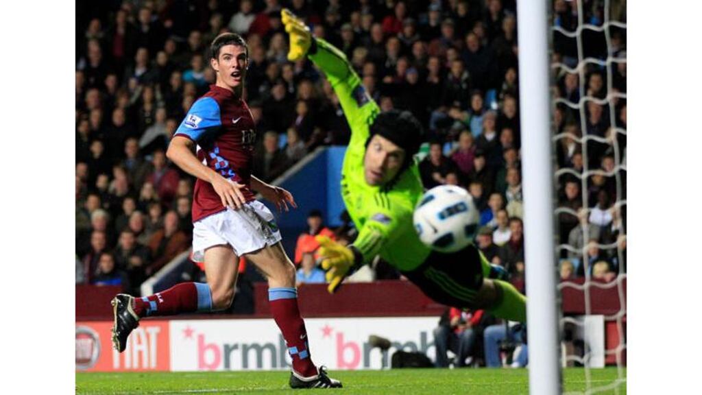 Aston Villa's Ciaran Clark (L) watches Chelsea's Petr Cech dive towards the ball during their English Premier League match at Villa Park (Photograph: Darren Staples/Reuters)