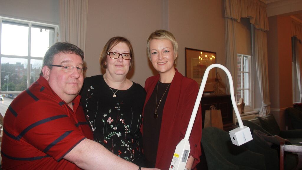 Shane and Marie Fitzsimons with midwife Kim Ryan and the neonatal camera the couple donated to Holles Street maternity hospital in memory of their son Aidan.
