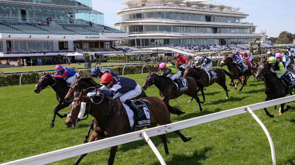 Twilight Payment ridden by Jye McNeil (No 6) on the way to victory   in the Melbourne Cup at the Flemington Racecourse. Photograph: George Salpigtidis/Racing Photos/AFP via  Getty Images