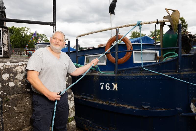 Matthew Daniels moors his barge at the Jamestown Heritage Festival
