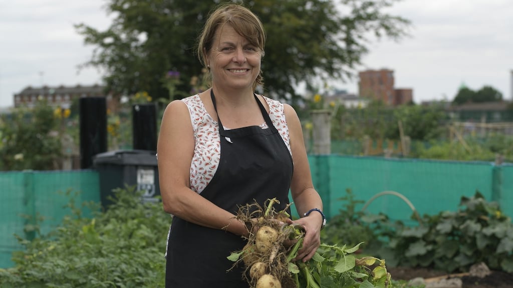 Anne Moloney, an allotment holder at Pearse College, with some of her freshly harvested Record potatoes. Photograph: Richard Johnston
