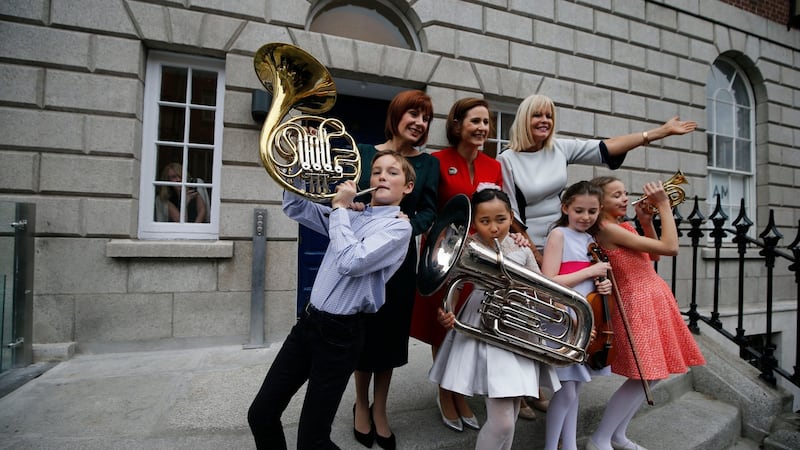 Minister for Culture Josepha Madigan, Minister of State for Higher Education Mary Mitchell O’Connor and Deborah Kelleher with Cormac Mac Canna (10), Yikai Zhao(7), Sarah Brazil (10) and Charlotte Croke (11) at the announcement of the development of the redevelopment of the Academy’s Westland Row campus. Photograph: Nick Bradshaw/The Irish Times