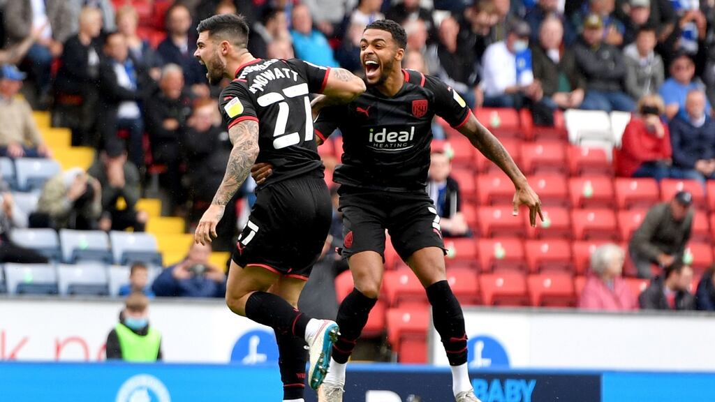 Alex Mowatt celebrates after opening the scoring for West Bromwich Albion against Blackburn. Photograph: Anthony Devlin/PA